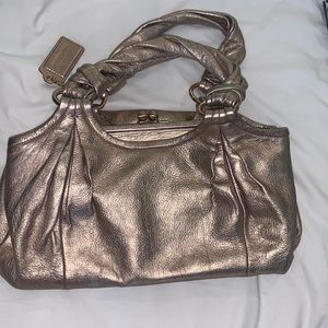 Coach (authentic) gold handbag, medium sized